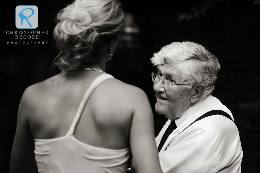 "This one is of Robert's maternal grandfather, Robert's namesake, and me. Robert was the first of the grandchildren in his family to get married and our wedding served as a kind of family reunion celebration. This photo captures the first time I had the opportunity to meet "Grandpa Bob."