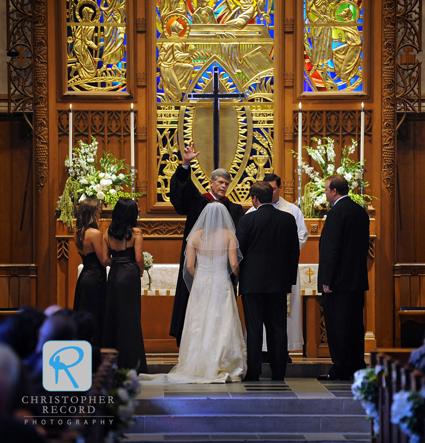 Stuart's father, the Rev. Arthur Ford Fogartie, conducts the service with an assist from the Rev. Patrick Cahill