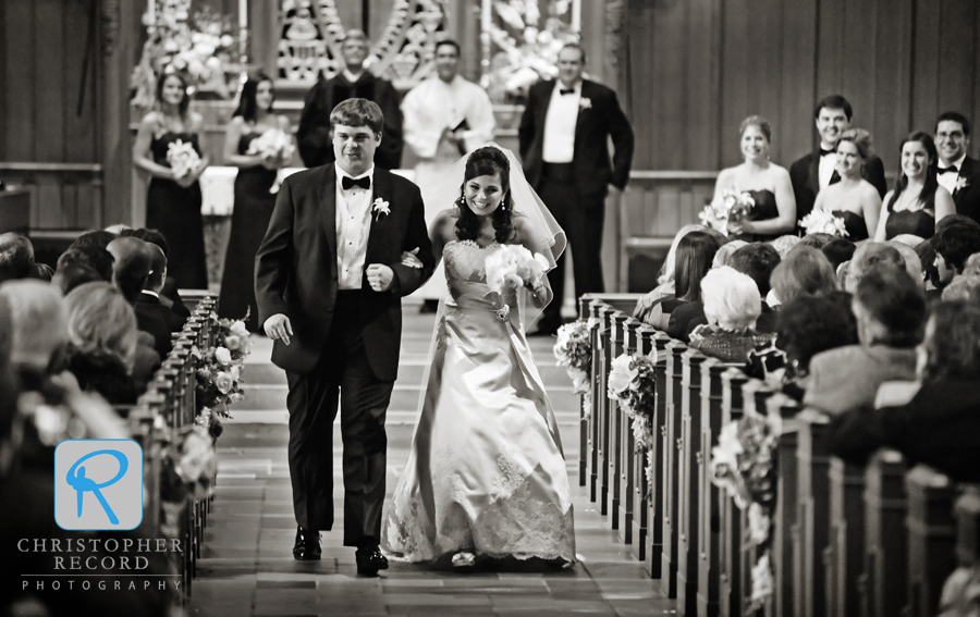 Jackie and Stu make their way back down the aisle