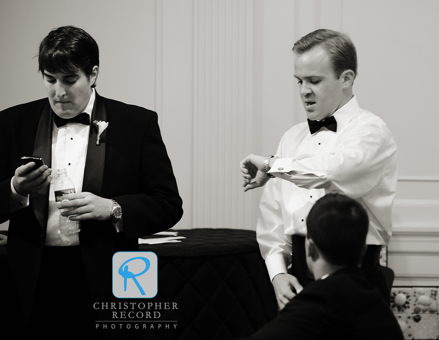 James checks the time before the ceremony