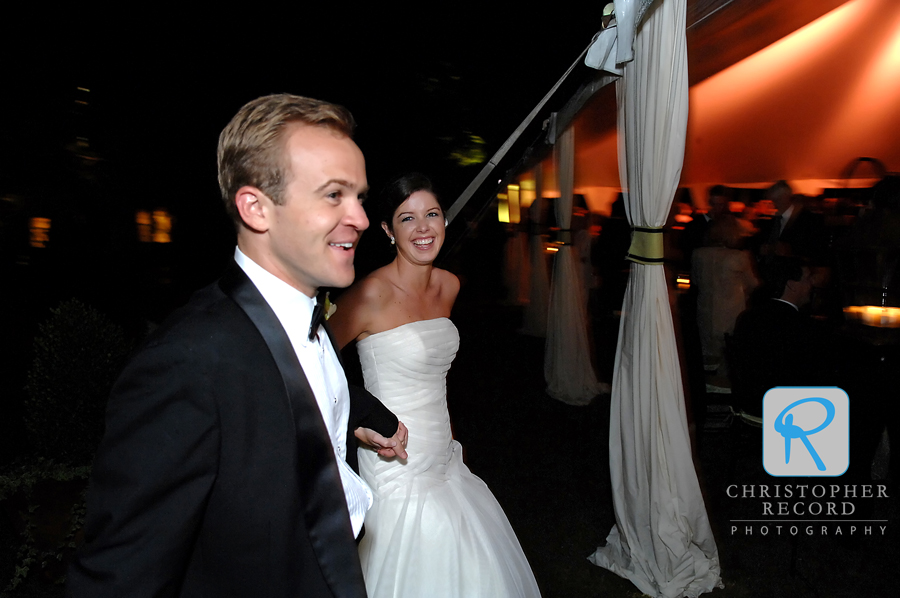 Lucy and James enter the reception