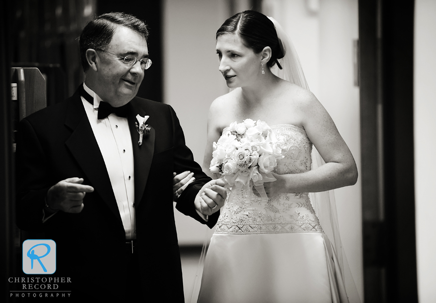 Amy and her dad compare notes as they wait for their entrance