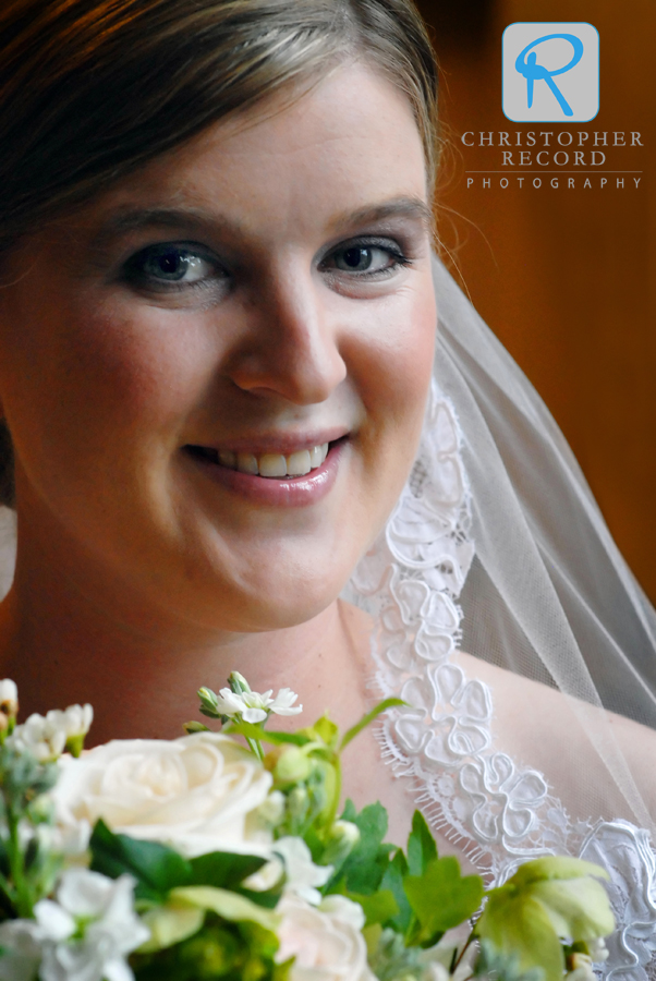 With rain pouring down outside, we found a window in a hallway for a quick portrait