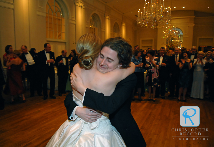 Sarah gets a big hug from her brother after they danced