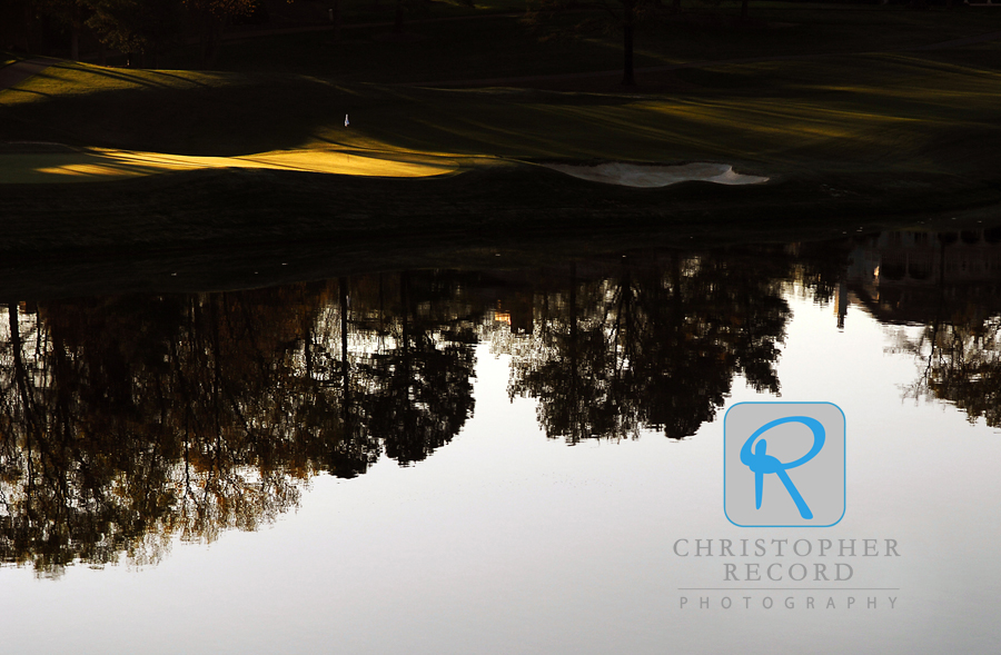 Water, here surrounding the 14th green, is a big part of Quail Hollow's challenge, and its beauty.