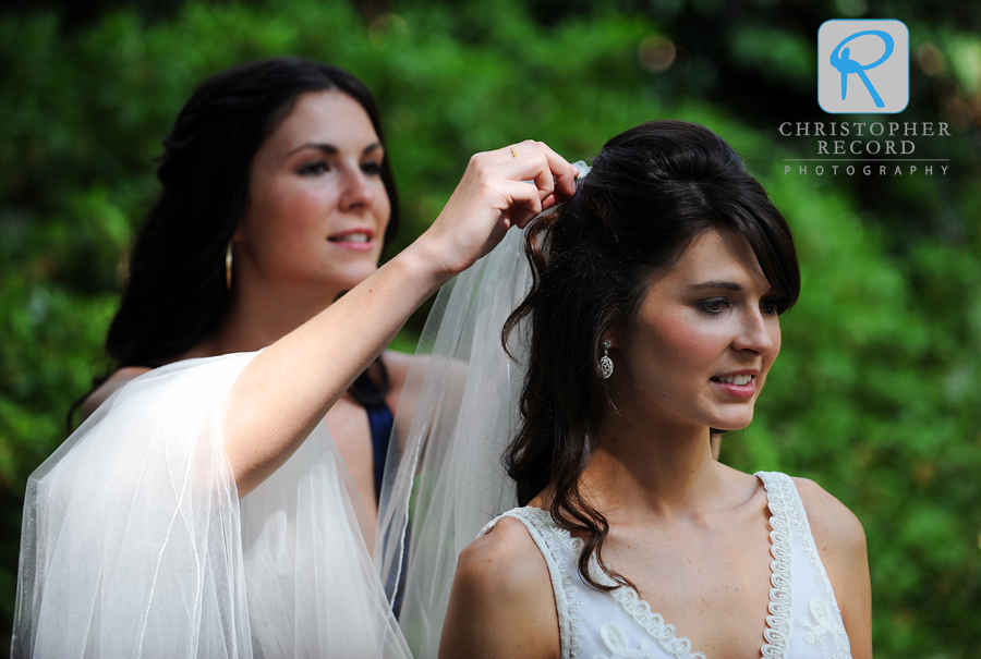 Stephanie helps Kelsey with her veil