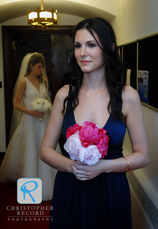 Kelsey waits as Stephanie prepars to walk down the aisle