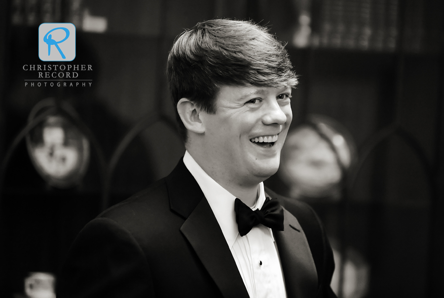 Taylor jokes with the groomsmen as they get ready