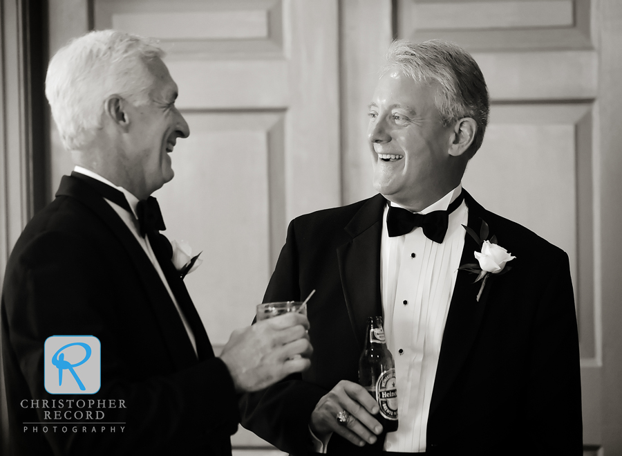 Elizabeth, left, and Taylor's dads enjoy the cocktail hour