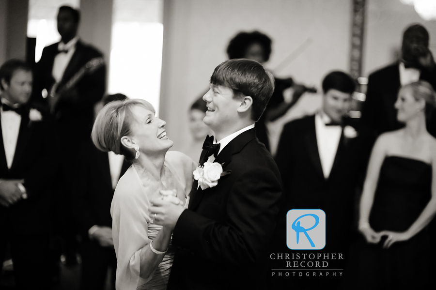 Taylor and his mother have fun during their dance