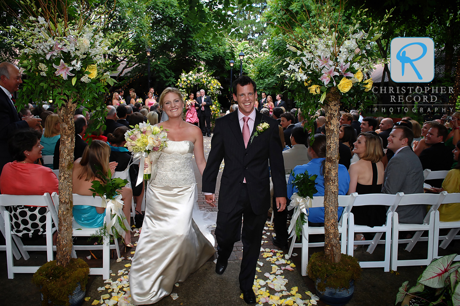 Kelly and Benny exit the ceremony