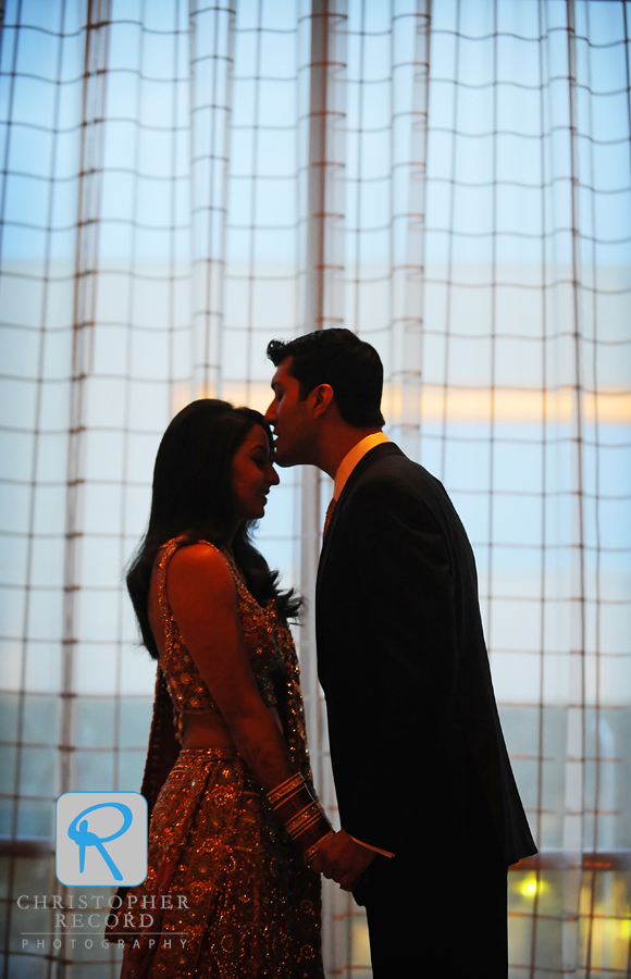 A quick kiss outside the reception