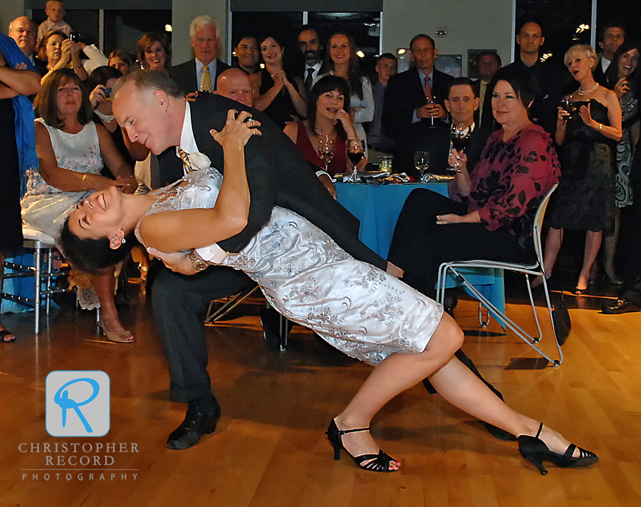 Jim dips Monette during their first dance