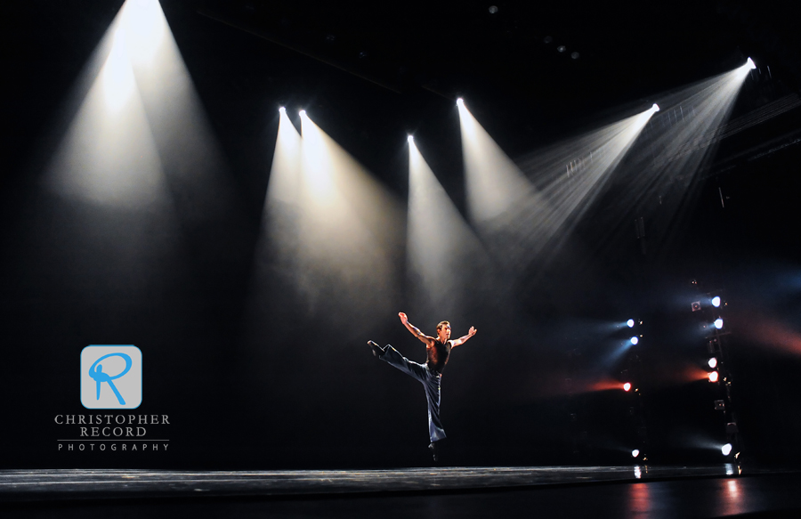 Justin VanWeest leaps across the Booth Playhouse stage in Dwight Rhoden's "Moody Booty Blues"