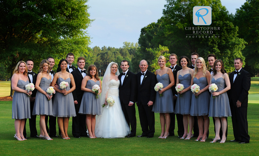 The wedding party on the back lawn at Quail Hollow