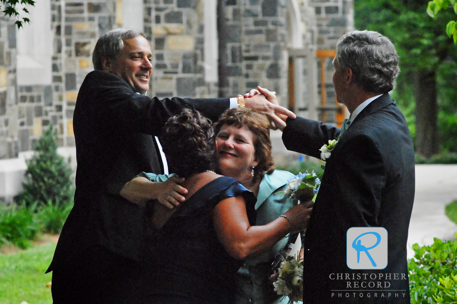 As I followed the couple, Laura-Chase captured this nice moment of both sets of parents celebrating