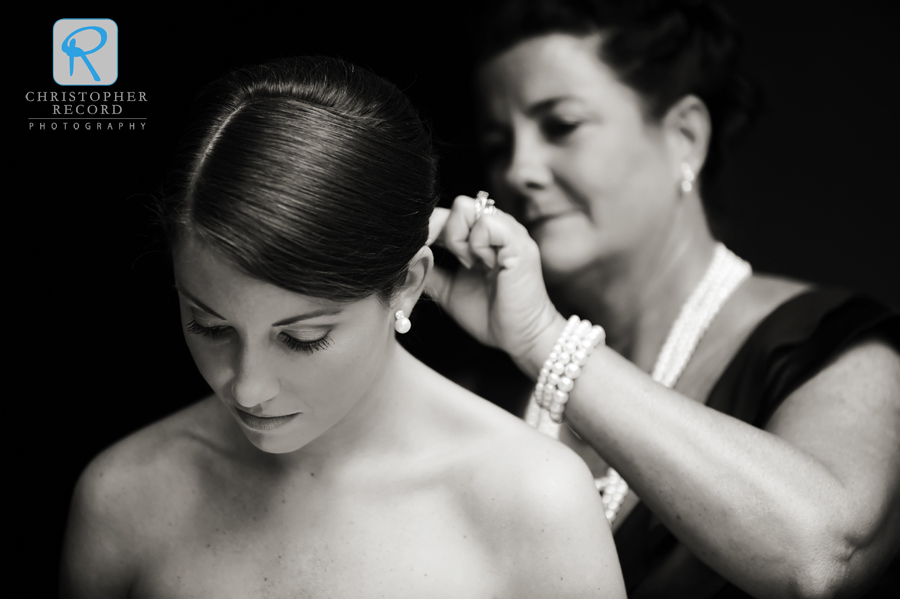 Tanner's mother prepares to bustle her dress