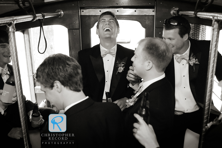 The groomsmen have some fun as they head to the reception