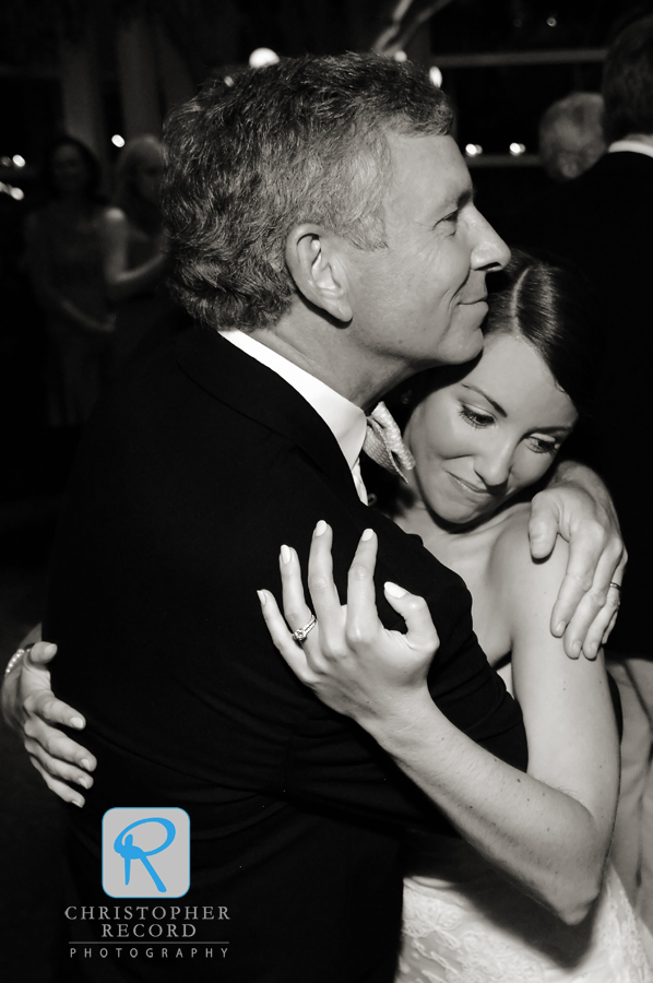 Tanner hugs her father after a special dance