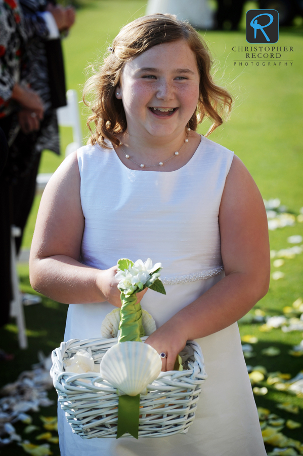 The flower girl, Mike's niece, makes her entrance