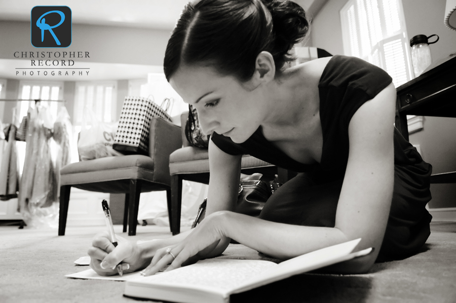 Ann writes a note to Byers as she gets ready at Davidson College Presbyterian Church