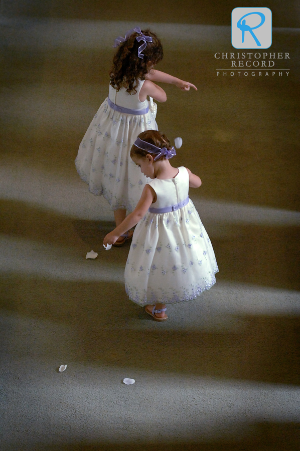 The flower girls, Ann's nieces, pave the way for the bride