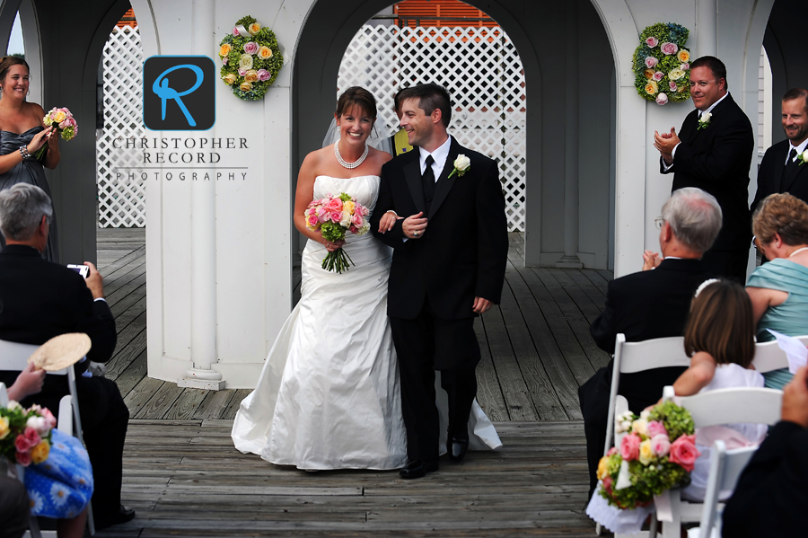 The happy couple leave the ceremony