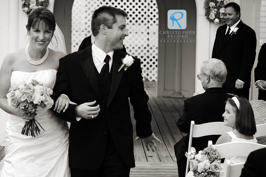 Nick glances back to one of his daughters following the service