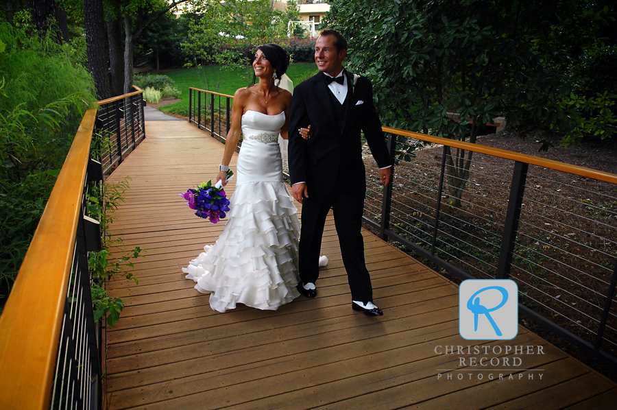 Tara and Ryan on the boardwalk at The Umstead Hotel and Spa in Cary
