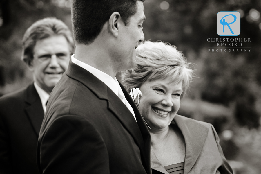 Sandy's mother celebrates with Tom 