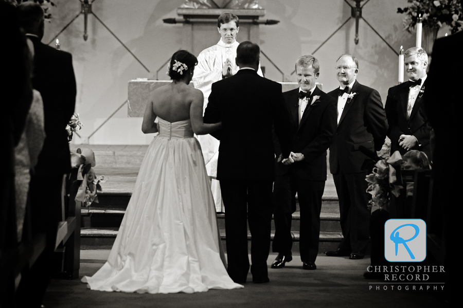 John watches as Amy arrives at the altar