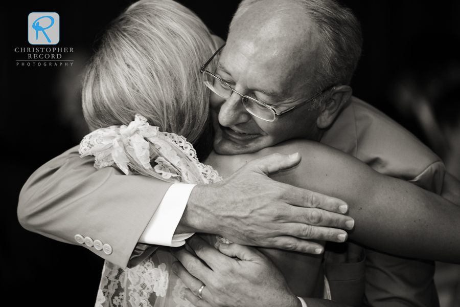 Ken embraces his daughter after their dance in a wonderful image from Adam