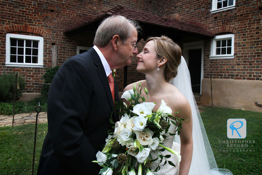 A kiss from her father