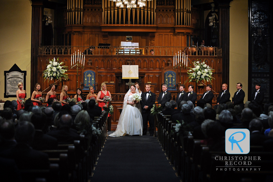 The Rev. Kerr has the wedding party turn to see the guests