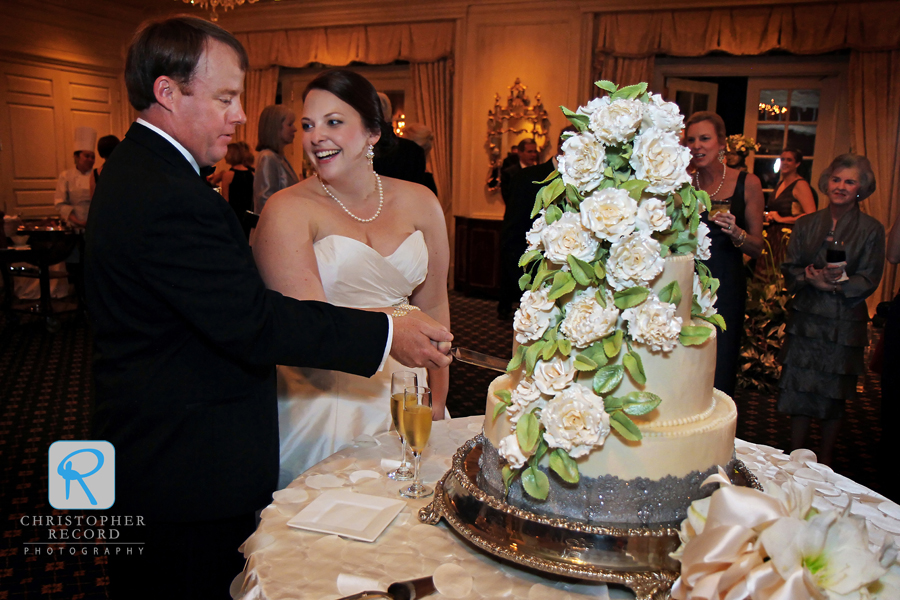 Getting ready to cut into an edible masterpiece from Kathy Allen Fine Wedding Cakes