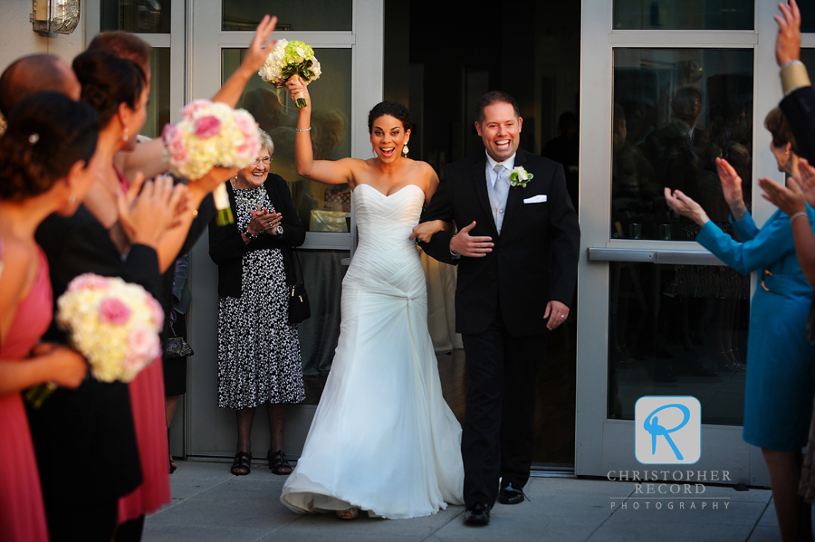 Melissa and Dan make a big entrance at The Harvey B. Gannt Center