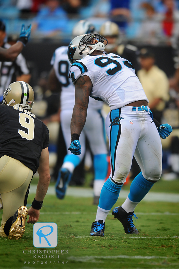 Panther Antwan Applewhite (93) lets out a roar after sacking Drew Brees