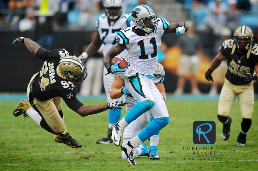 Panther receiver Brandon LaFell (11), who had a big game, picks up yardage after a catch