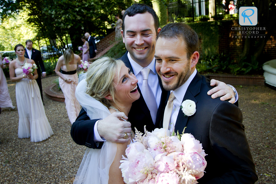 Cameron hugs his sister and new brother-in-law