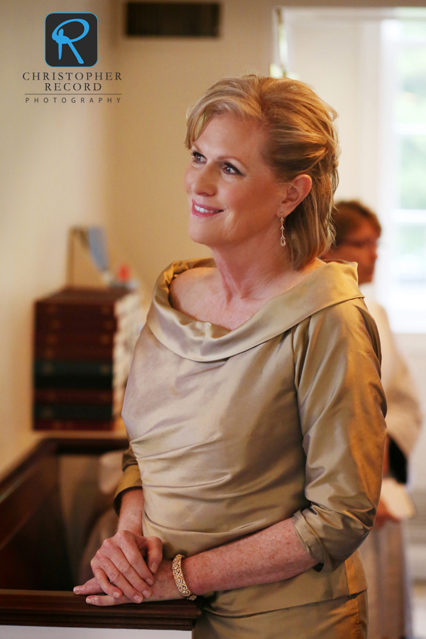 Margaret's mother, Anne Marie, waits for the bride to enter the church