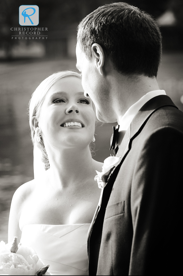 The bride glances at her new husband