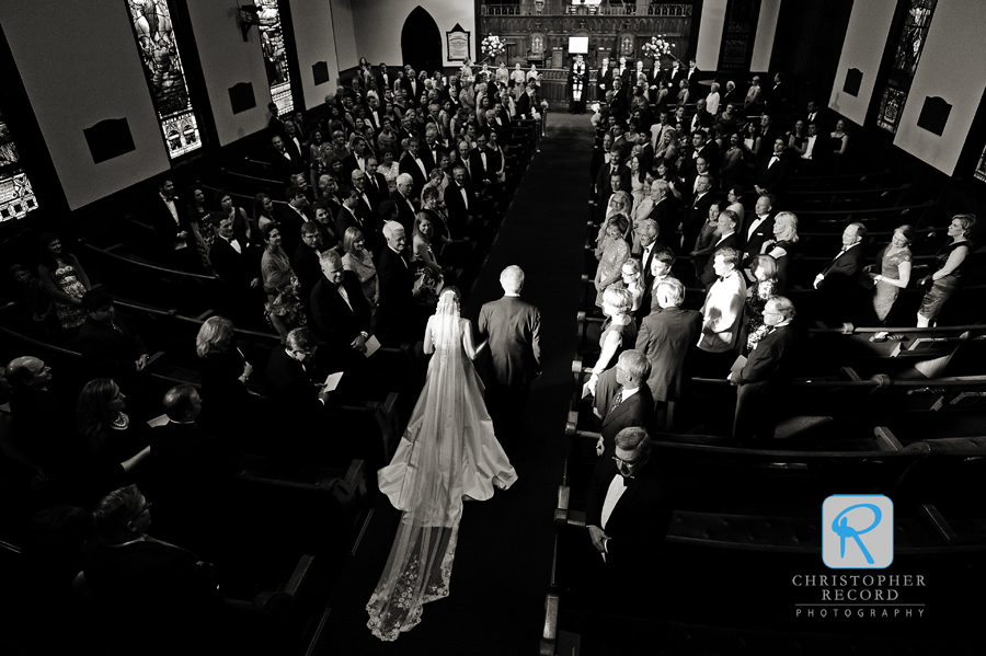 Striking light as the bride enters from Laura's angle in the balcony