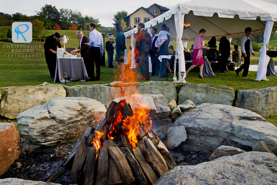 An outdoor fire helped fight a hint of autumn in the mountain air